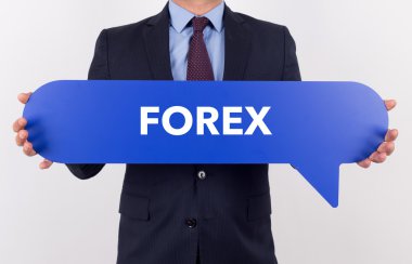 konuşma balonu tutan işadamı