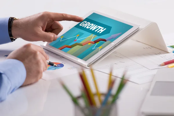 Businessman working on tablet — Stock Photo, Image