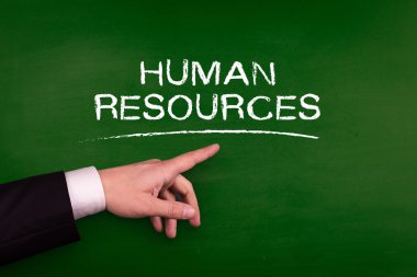 Tahtaya işaret eden işadamı