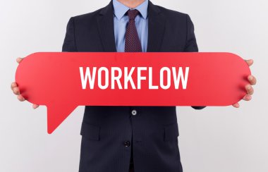 konuşma balonu tutan işadamı