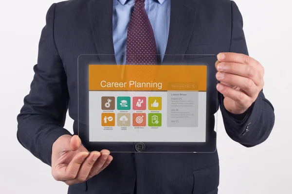 Businessman holding transparent tablet pc — Stock Photo, Image