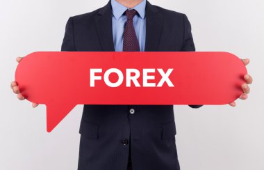 konuşma balonu tutan işadamı