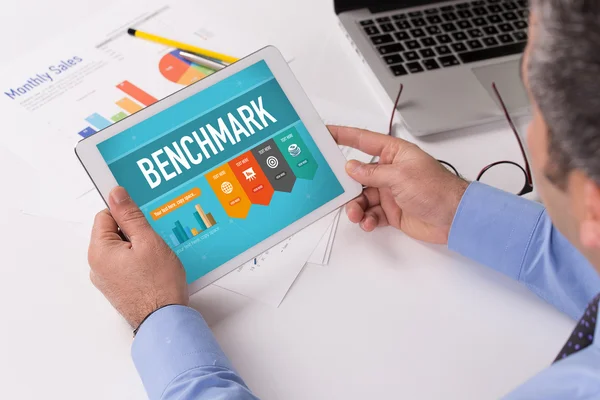 stock image Businessman working on tablet