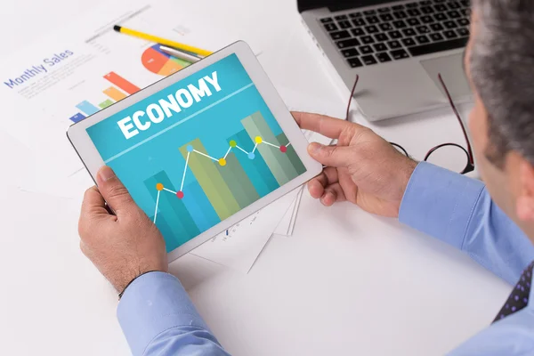 Businessman working on tablet — Stock Photo, Image