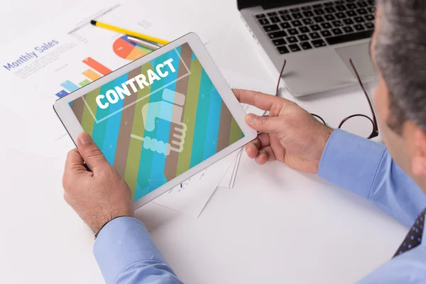 Businessman working on tablet — Stock Photo, Image