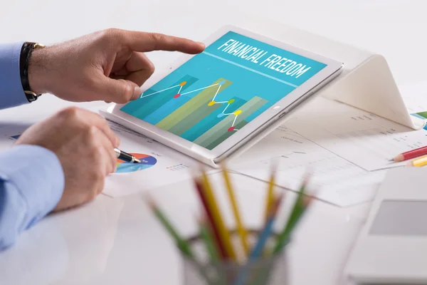 Businessman working on tablet — Stock Photo, Image