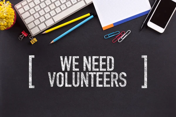 WE NEED VOLUNTEERS text — Stock Photo, Image