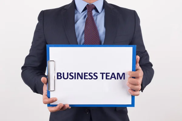 Businessman showing paper — Stock Photo, Image