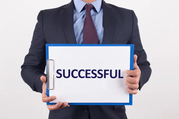 Businessman showing paper — Stock Photo, Image