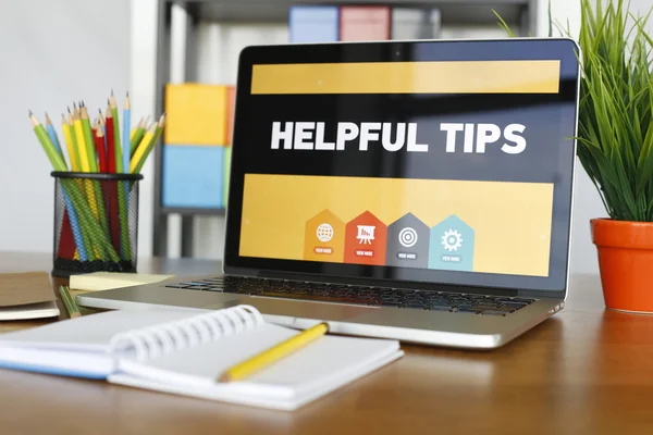 Helpful Tips text on laptop — Stock Photo, Image