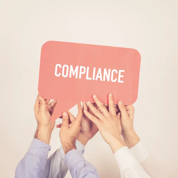 People holding written speech bubble — Stock Photo, Image