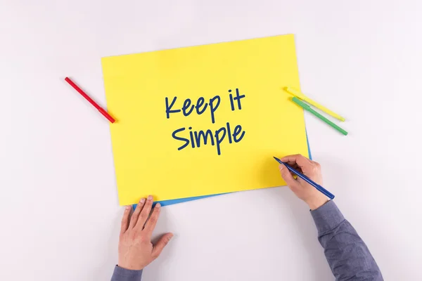 Hand writing on yellow paper — Stock Photo, Image