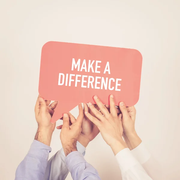 People holding written speech bubble — Stock Photo, Image