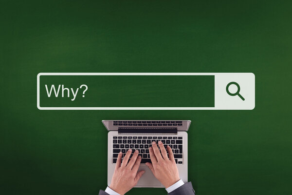 person typing on laptop keyboard