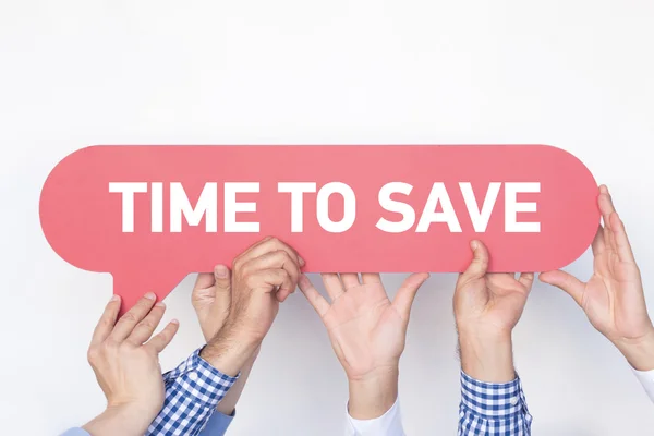 Group of people holding speech bubble — Stock Photo, Image