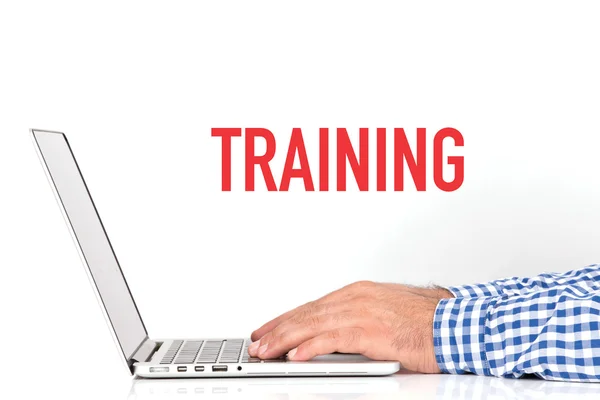 Young man working with laptop — Stock Photo, Image