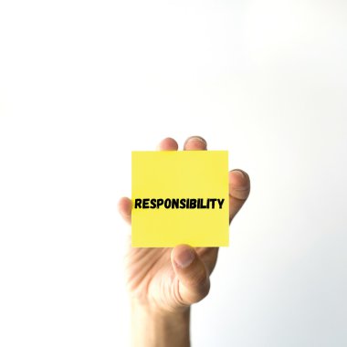 El tutma sarı yapışkan not