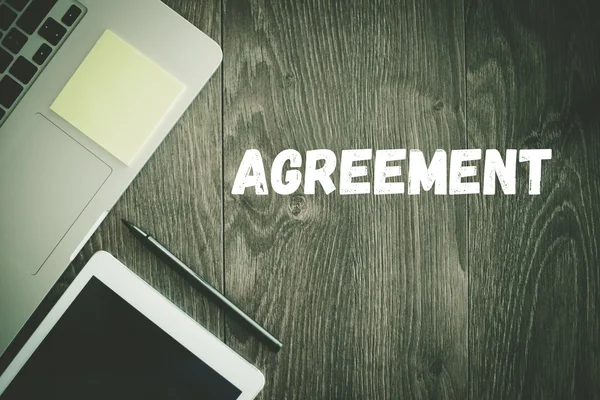 AGREEMENT text on desk — Stock Photo, Image