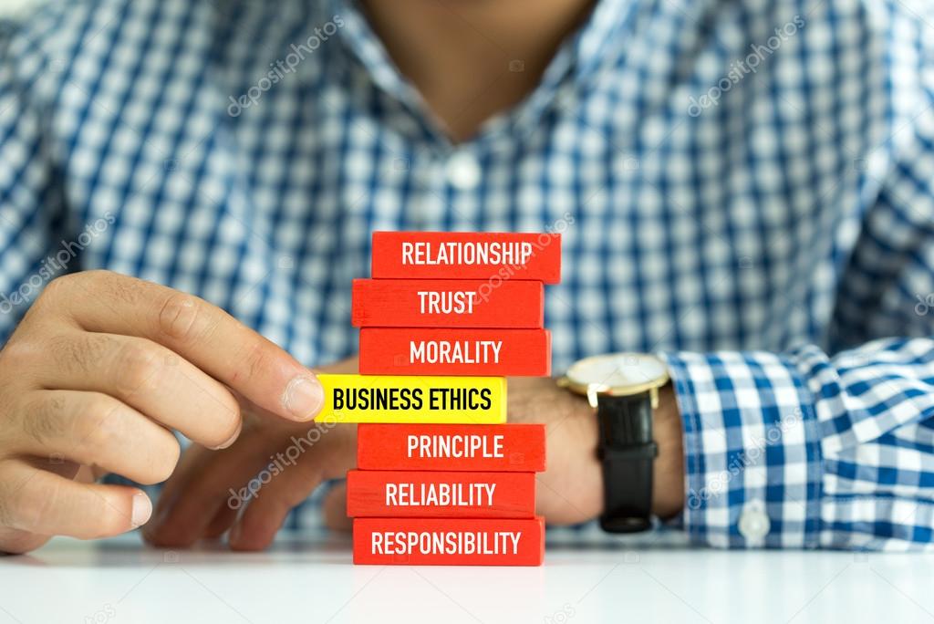 BUSINESS ETHICS words on Wooden Block