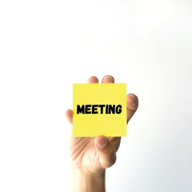 El tutma sarı yapışkan not