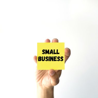 El tutma sarı yapışkan not