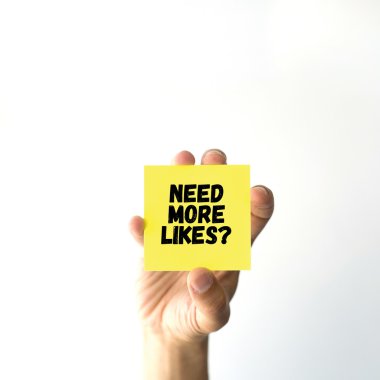 El tutma sarı yapışkan not