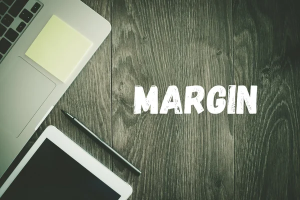 Testo MARGIN sulla scrivania — Foto Stock