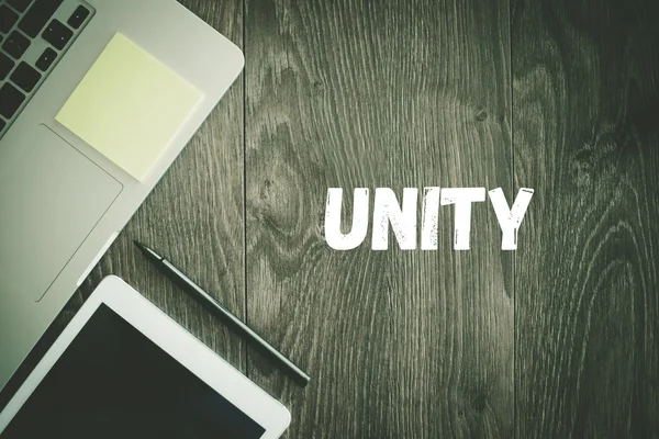 Texto UNITY sobre mesa — Fotografia de Stock