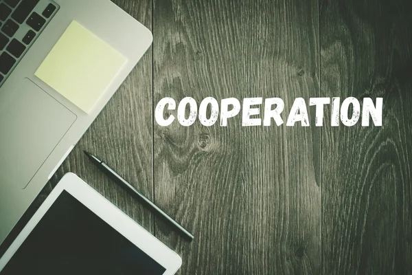 Kooperationstext auf dem Schreibtisch — Stockfoto