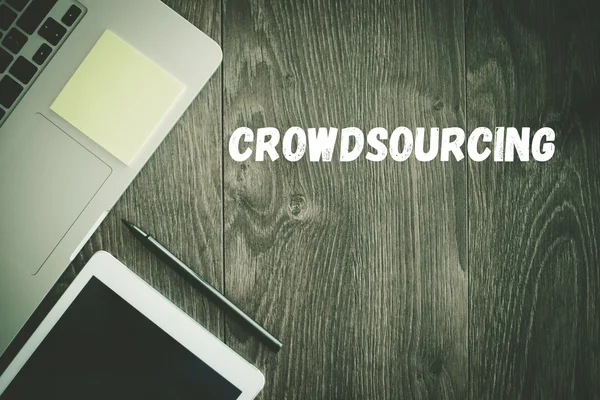 CROWDSOURCING  text on desk — Stock Photo, Image