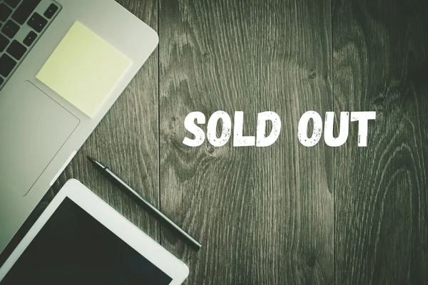 SOLD OUT text on desk — Stock Photo, Image