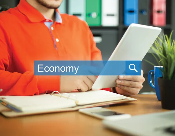 Young man searching with tablet pc — Stock Photo, Image