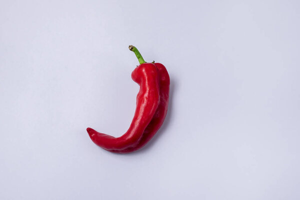 Red Hot Chili Peppers on Blue Background Spices Top View Horizontal