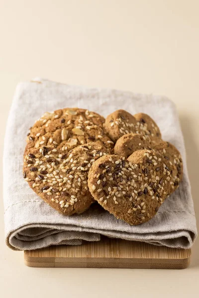 Tasty Heart of the Cookies on Napkin Homemade Cookies in Shape of Hearts Vertical Close Up