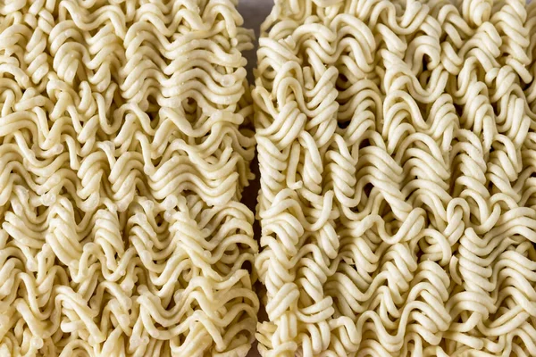 Close Up Asian Dried Noodles of Fast Preparation Light Gray Background Horizontal