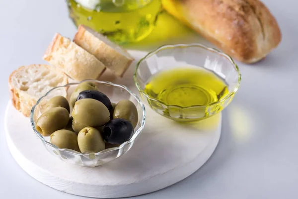 Bowls Green Black Olive Olive Oil White Tray Artisan Bread — Stock Photo, Image