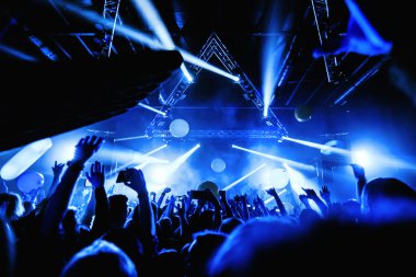 night club party event concert with crowd of people at the stage clipart
