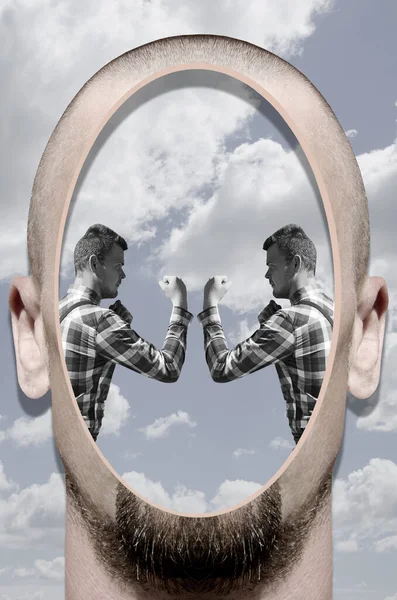 Gerçeküstücülük tarzında bir kolaj kafa ve dövüş pozisyonunda bir adam