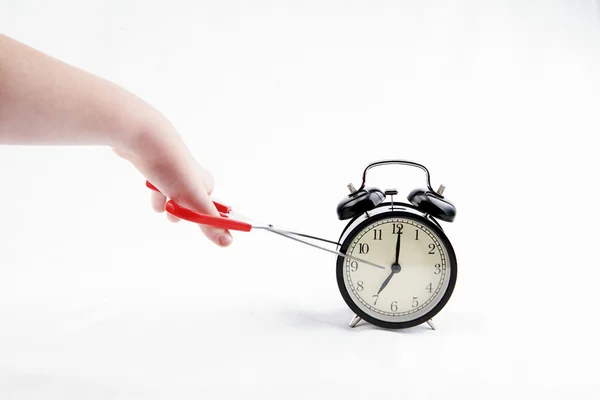 Hand cuts the time — Stock Photo, Image