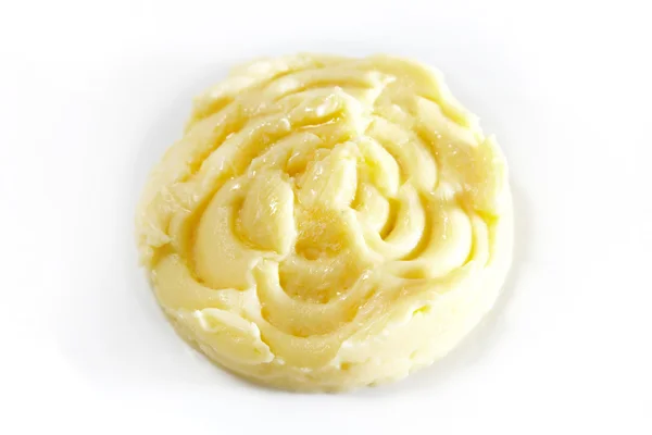 Mashed potatoes with butter on white background — Stock Photo, Image