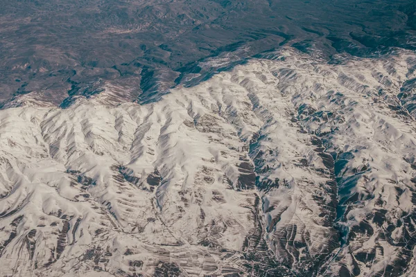 Vista superior das montanhas de neve — Fotografia de Stock