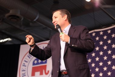 Ted Cruz gestures at a political rally in Des Moines, Iowa, on October 31, 2015 clipart