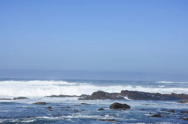 Seaside scenery with blue sky background