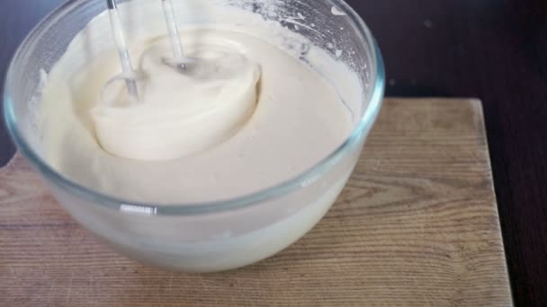 Baker gets mixer whisk from dough. Process of kneading dough — Stock Video