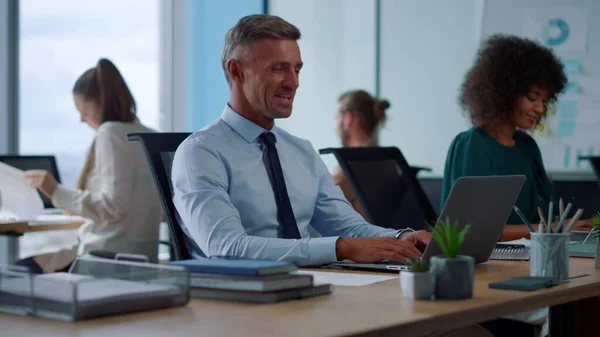 Businessman using laptop for video call. Businessman chatting online on computer