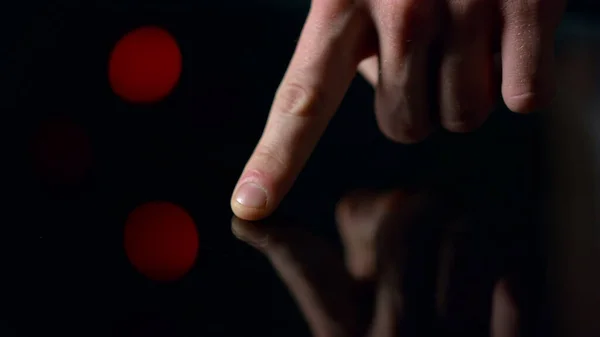 Macro video of man finger touching black surface. Accurate male finger . — Stock Photo, Image