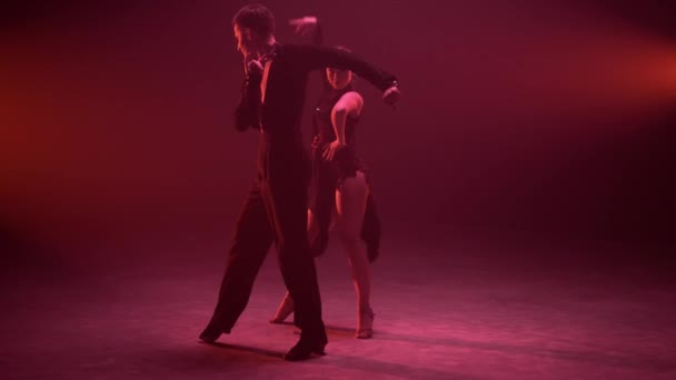 Ballroom couple dancing cha cha cha indoors. Dance couple performing competition — Stock Video