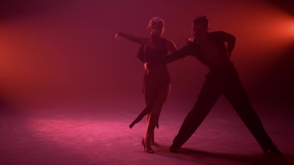 Passionate couple bending during dance indoors. Ballroom partners dancing — Stock Video
