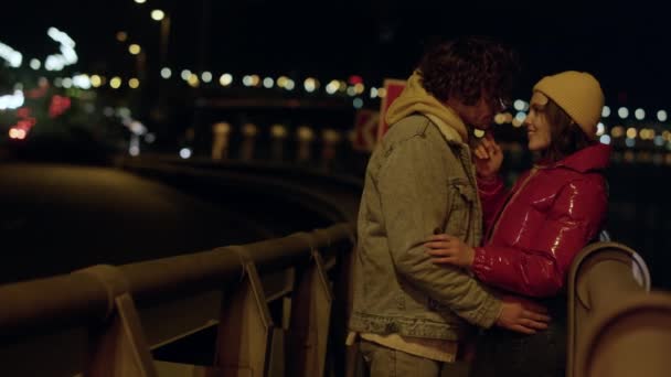 Love couple walking on city street. Woman touching man face on urban background. — Stock Video