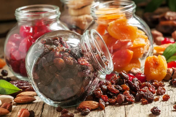 Dry fruits in a glass jars — Stock fotografie